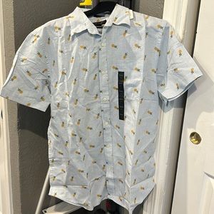 Man pineapple button shirt.